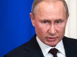 The Guardian: Россия "наняла сеть британцев, чтобы преследовать врагов Путина"