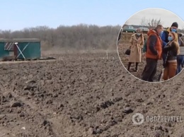 Заровняли трактором: на Киевщине у участников АТО ''отжали'' 300 участков земли