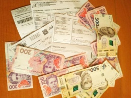 Украинцы сократили долги за коммуналку почти на миллиард