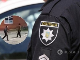 В Харькове иностранец избил полицейского из-за масочного режима. Инцидент попал на видео