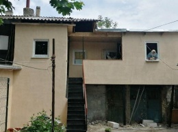 Коммунальщики отремонтировали дом на Молдаванке, пострадавший во время февральского шторма