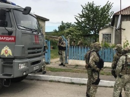В аннексированном Крыму российский ОМОН проводит обыски у крымских татар
