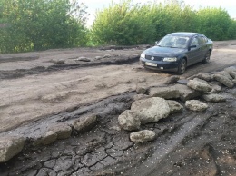 Как будто после бомбежки: водители показали катастрофически "убитую" международную трассу Кишинев-Полтава (фото)