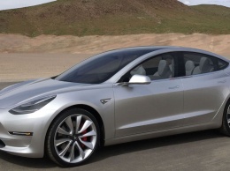 Tesla добавила беспроводную зарядку телефонов в электромобили Model 3