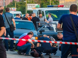 В Днепре на Запорожском шоссе застрелили полицейского: фото и видео с места происшествия