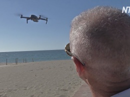 "Умные" туалеты и патрульные дроны: как отдыхается на пляжах Андалусии в условиях пандемии
