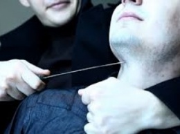 В Запорожье мужчине пытались перерезать горло из-за сигареты