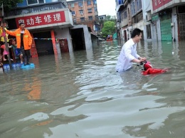От наводнений в Китае пострадали более 30 млн человек
