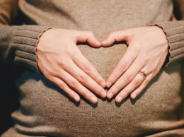 COVID-19 может передаваться от беременной к ребенку
