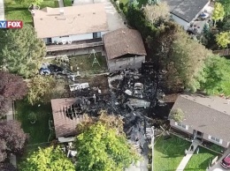 Авиакатастрофа в США: самолет упал на жилые дома