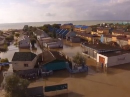 Последствия "Армагедона" в Кирилловке - дома и машины стоят в воде (видео)