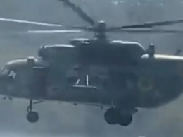 Перевернул лодку: под Харьковом военный вертолет пронесся в двух метрах над пляжем с людьми (видео)