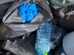 В Киеве компания по утилизации опасных отходов сбрасывала использованные шприцы на стихийную свалку. Фото
