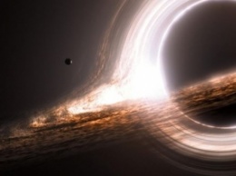 "Голодная" черная дыра поглощает в сутки по звезде