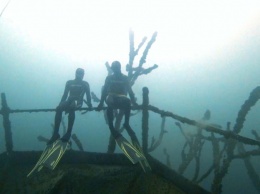 Вечеринка под водой: дайверы Украины устраивают посиделки в подводном музее