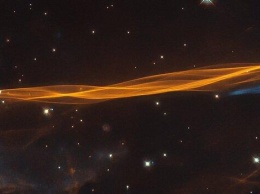 Словно вуаль: Хаббл сделал снимок взрывной волны от сверхновой