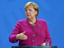 Меркель заявила, что "Северный поток-2" нужно достроить даже несмотря на санкции США