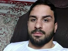 В МОК шокированы казнью иранского борца Афкари