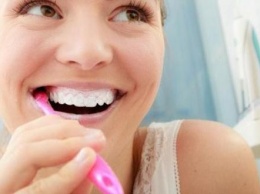 Как отбелить зубы: стоматологи рассказали, поможет ли сода