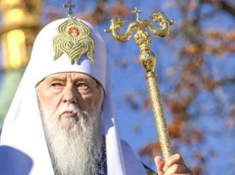 Филарет попробует помочь украинскомку воину вместе с Папай Римским