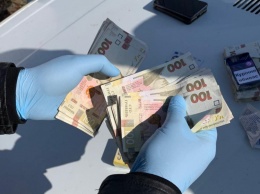 В Одесской области чиновника мэрии задержали по подозрению в подкупе члена избиркома