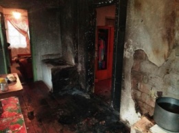 В Запорожской области из-за неправильной эксплуатации печки едва не сгорел дом (фото)
