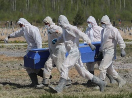 Умерших от COVID-19 будут хоронить в гробах с крышками из стекла