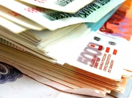 Россияне за месяц забрали из банков валюту еще на миллиард долларов