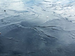 На Днепропетровщине из-подо льда достали трупы двух рыбаков: фото