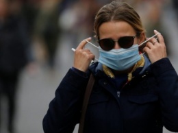 ВОЗ призывает носить маски даже после COVID-вакцинации