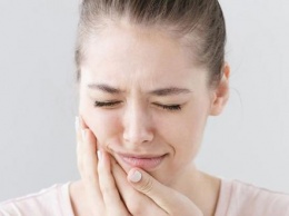 Если донимает прорезавшийся зуб мудрости: как домашними способами снять боль