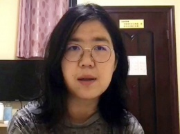 Китайский суд приговорил к тюремному сроку журналистку, освещавшую вспышку COVID-19 в Ухани