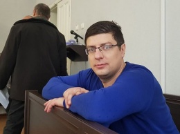 Суд оправдал экс-полицейского, которого поймали на взятке в 30 тыс долл