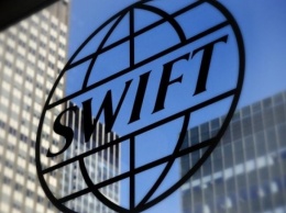 Экономист перечислил последствия отключения России от SWIFT