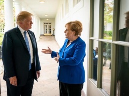 Меркель разозлилась из-за штурма Капитолия, Зеленский осуждает