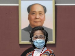 Жители Китая получат вакцину от COVID бесплатно
