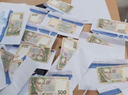 Кандидат в депутаты Киевсовета раздавал по 1000 гривен за голос за него