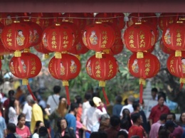 В Китае раздают деньги гражданам, чтобы те провели Новый год дома