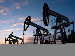 Американские нефтяные гиганты ExxonMobil и Chevron говорили о крупнейшем в истории слиянии - Reuters