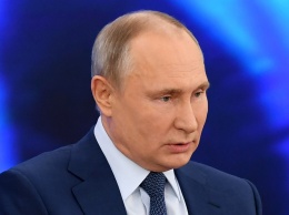 Путин наградил 23-летнего сына владельца "Русской медиагруппы"
