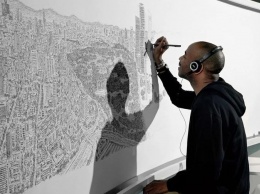 Художник-аутист по памяти рисует целые города