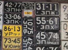Житель Запорожской области собрал полтысячи автомобильных номеров со всего мира - фото
