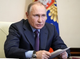 Путин вакцинировался от коронавируса за закрытыми дверями