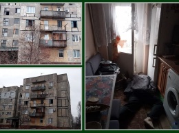 В Донецке показали пострадавший от обстрелов дом и погибшего мужчину. Фото, видео 18+
