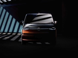 На тизере показали VW T7 Multivan 2021 года с практичным салоном