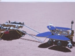 Китайский марсоход сошел с посадочной платформы и начал исследование Марса (ФОТО)
