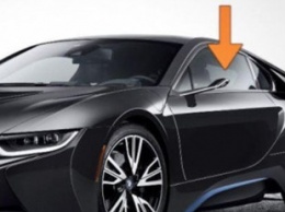 BMW заменяет наружные зеркала заднего вида на специальные проекторы