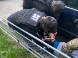 В Киеве задержали торговцев оружием из зоны ООС