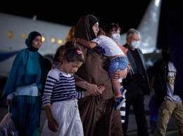 Женщину с семерыми детьми вернули в Украину из лагеря в Сирии (ФОТО)