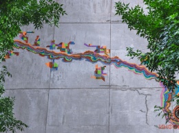 В Днепре французский художник создает мурал на фасаде Строительной академии